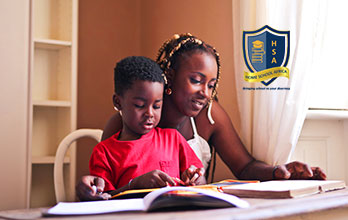 homeschooling in Nairobi, kenya, homeschooling-in-nairobi-mom-helps-her-son-school-homework